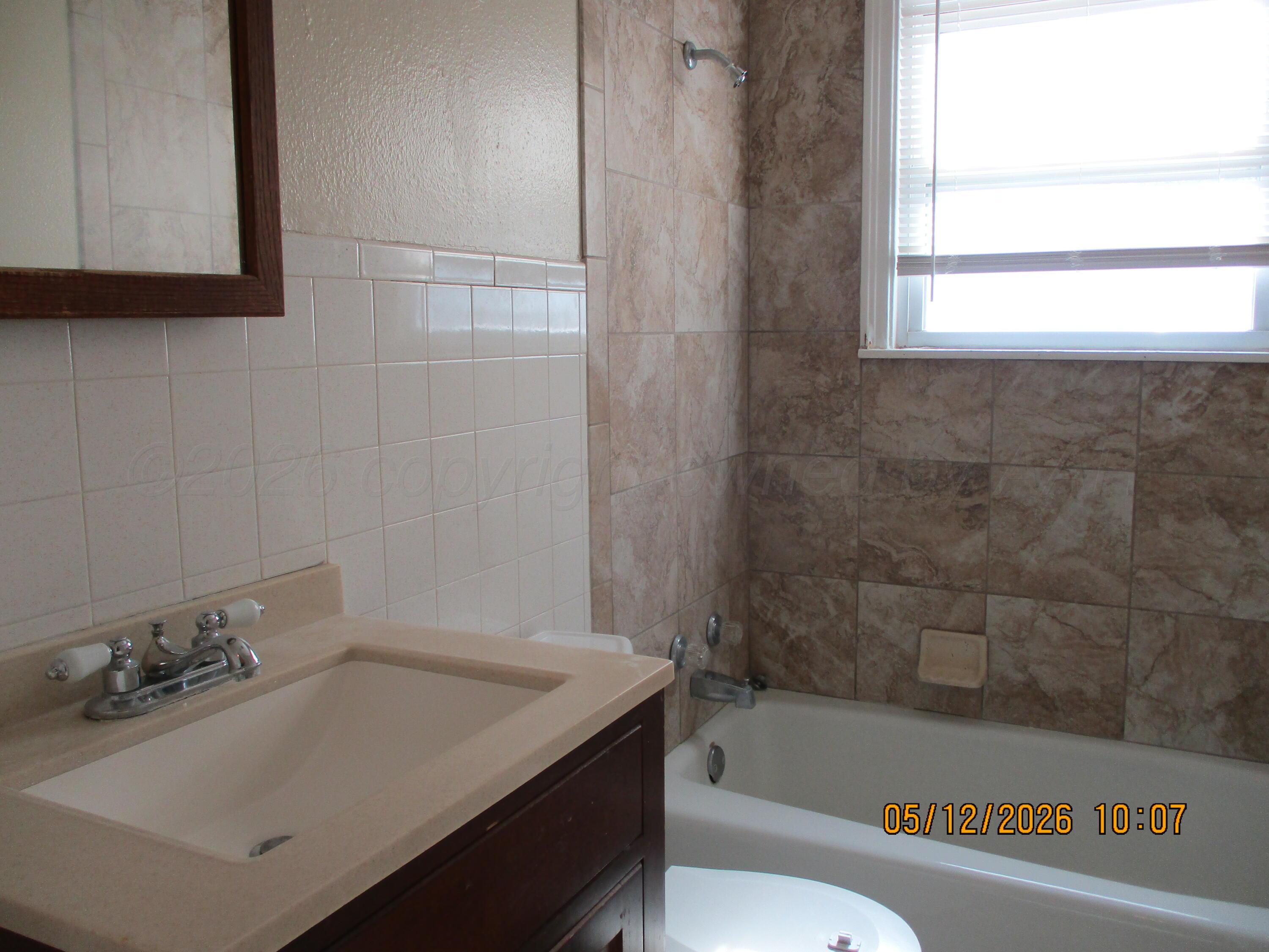 4203 South Monroe Street Amarillo, TX 79110 - Photo 5 of 10 bathroom