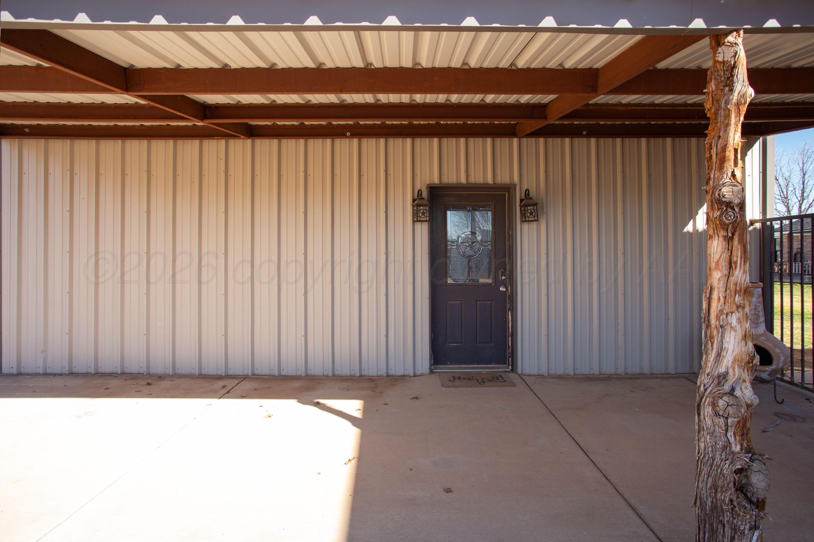 16310 Prairie Garden Road Canyon, TX 79015 - Photo 23 of 56 Covered porch of living quarters in shop