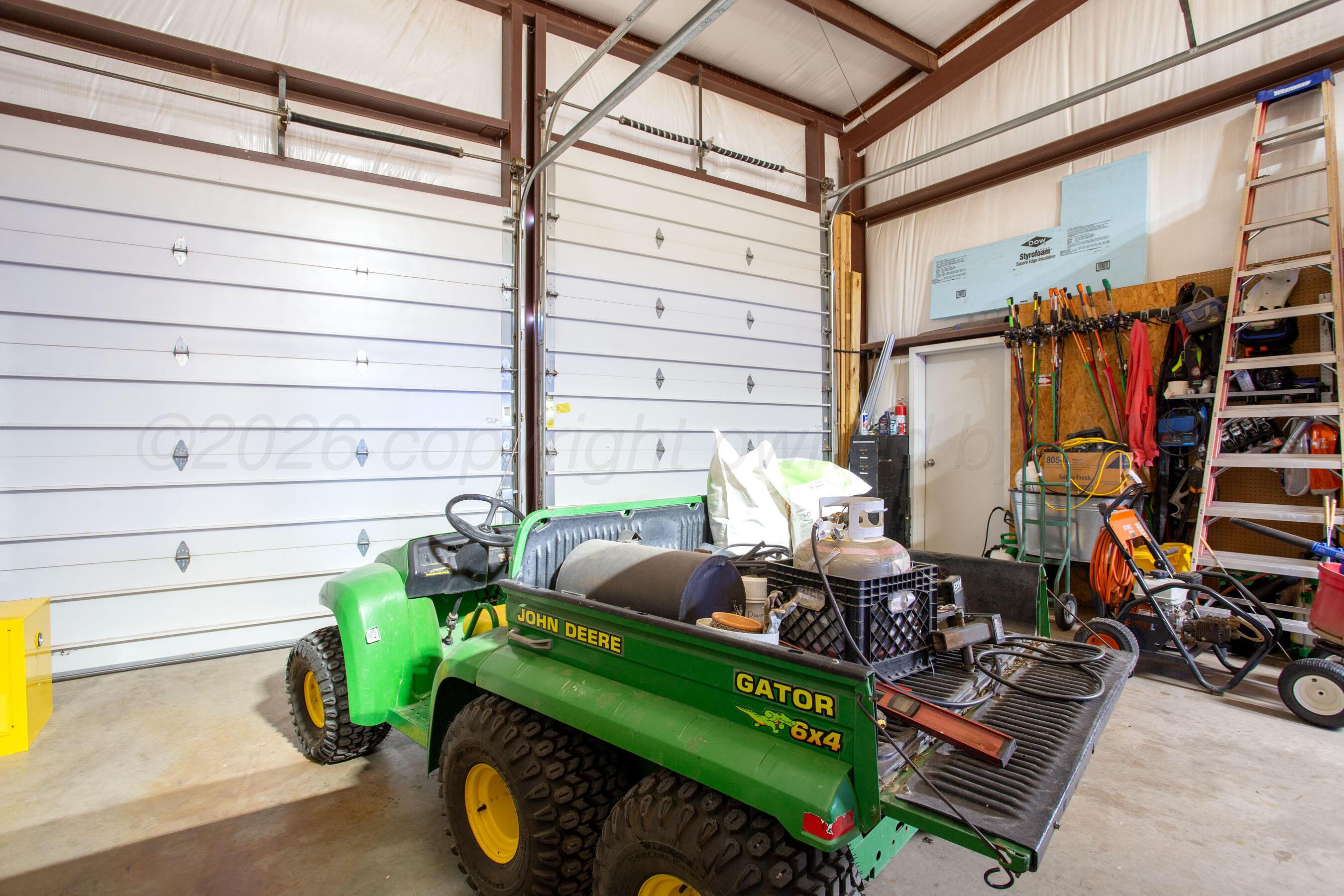16310 Prairie Garden Road Canyon, TX 79015 - Photo 33 of 56 Shop area overhead doors