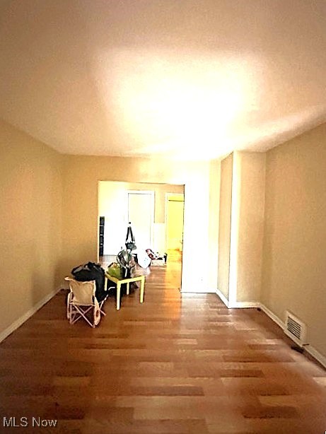 888 Rondel Road Cleveland, OH 44110 - Photo 10 of 35 Sitting room with wood finished floors and baseboards