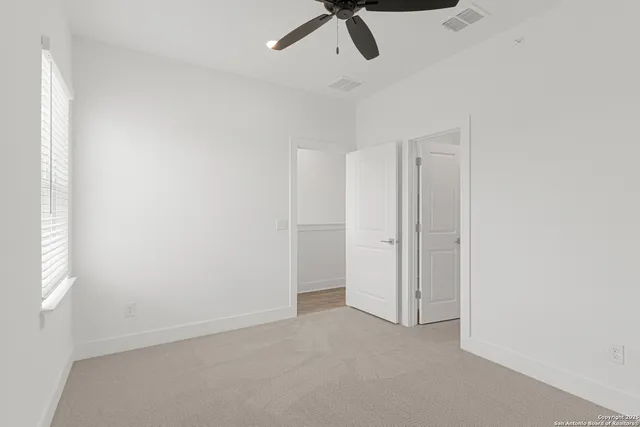 a view of backyard with a chair and a fireplace