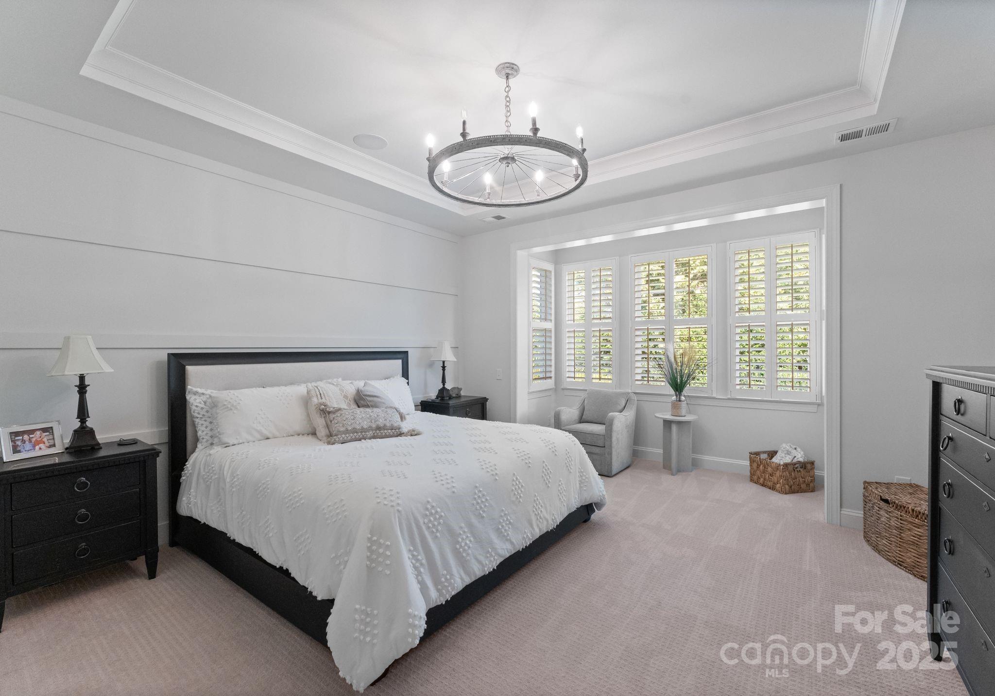 12019 Huntson Reserve Road Huntersville, NC 28078 - Photo 18 of 43 a bedroom with a bed and a large window