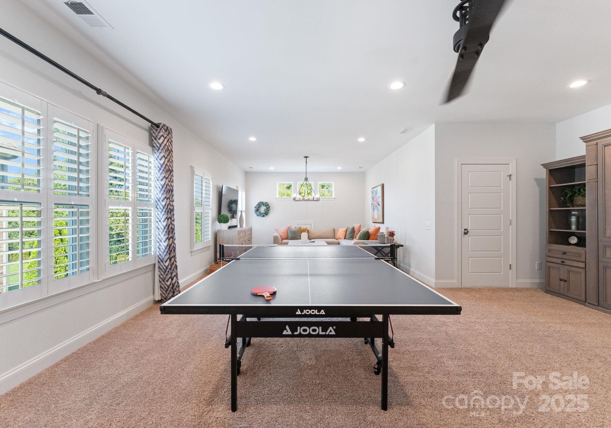 12019 Huntson Reserve Road Huntersville, NC 28078 - Photo 35 of 43 a view of a workspace with furniture and window
