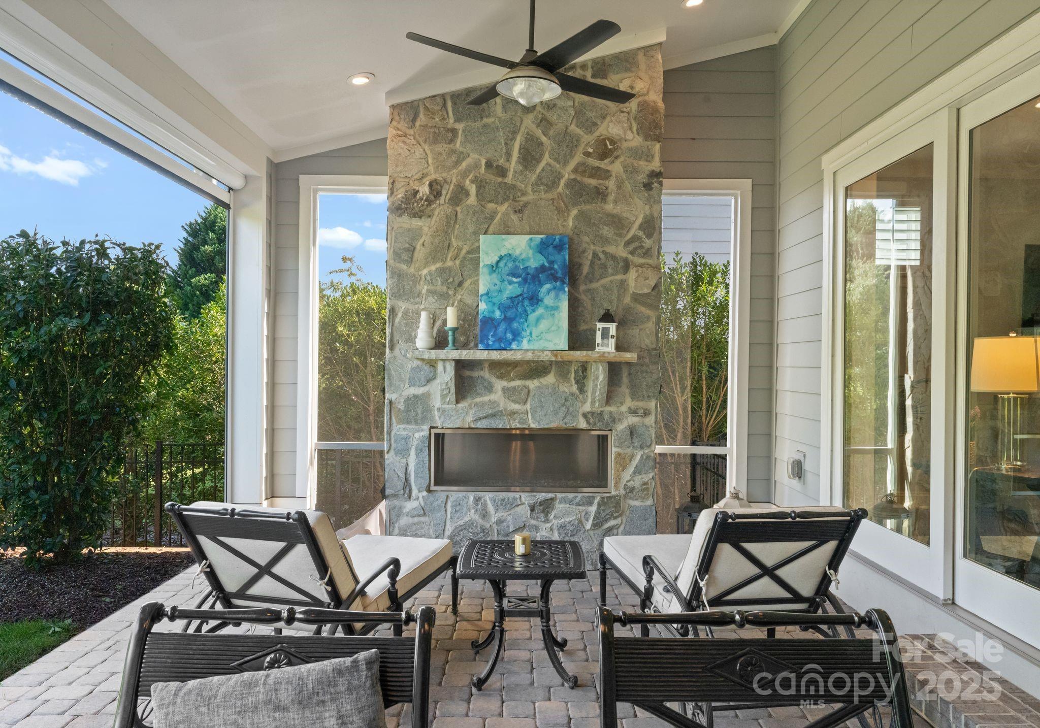12019 Huntson Reserve Road Huntersville, NC 28078 - Photo 38 of 43 a living room with furniture and a fireplace