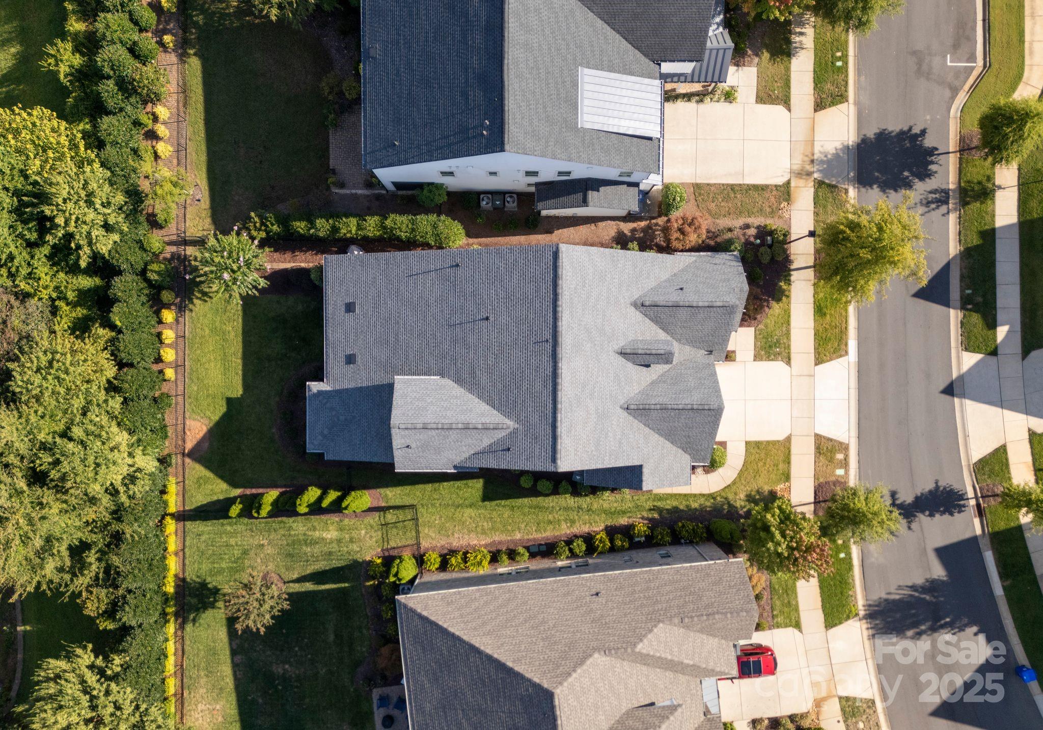 12019 Huntson Reserve Road Huntersville, NC 28078 - Photo 43 of 43 an aerial view of a house with a swimming pool
