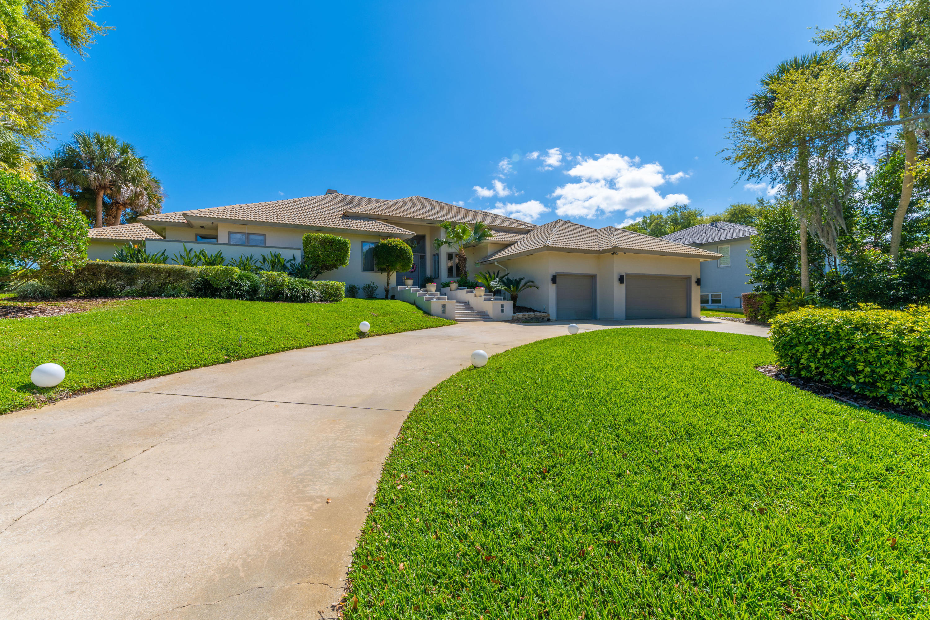 3835 Raney Road Titusville, FL 32780 - Photo 2 of 55 a view of a house with a yard and potted plants