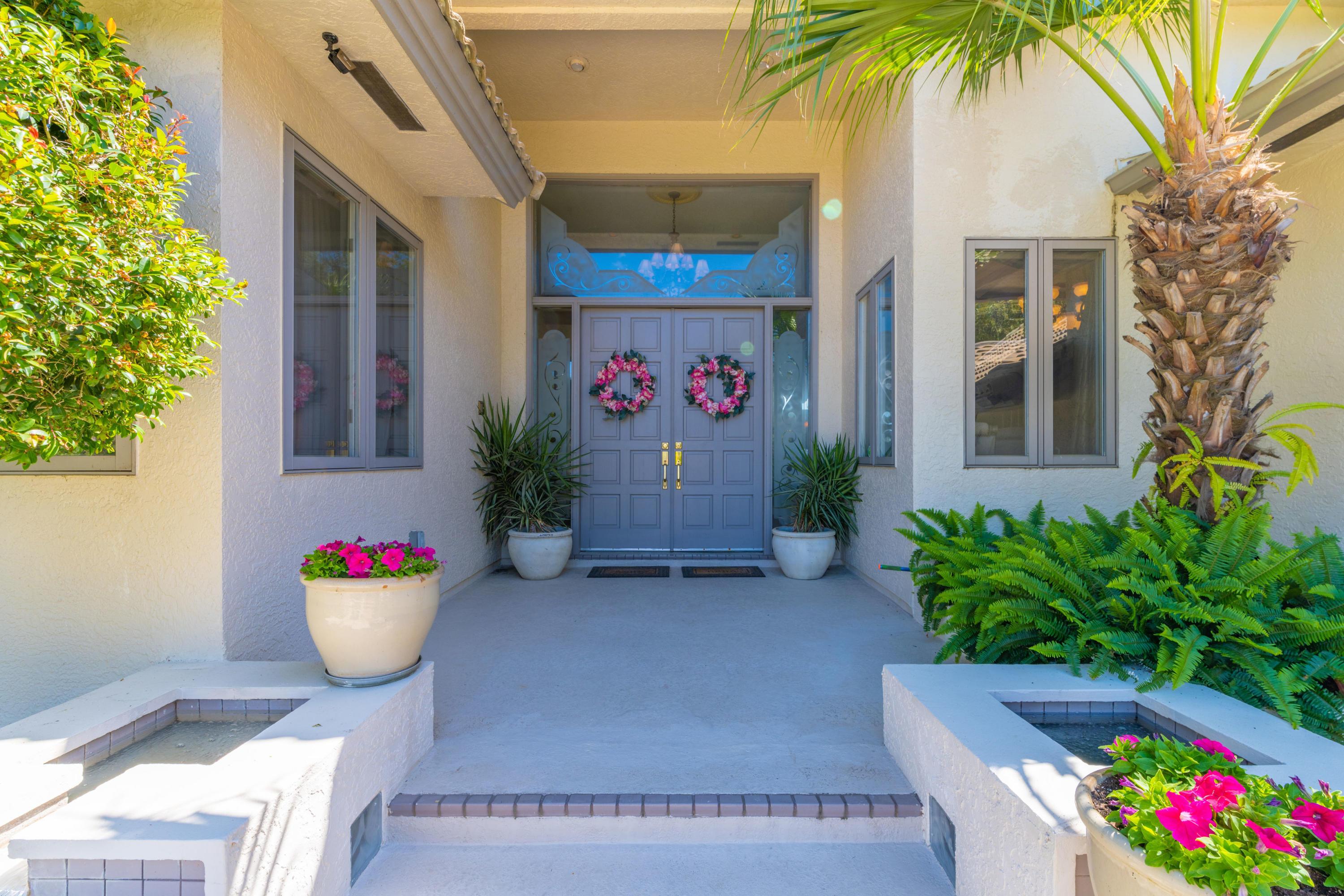 3835 Raney Road Titusville, FL 32780 - Photo 13 of 55 a front view of a house with entryway