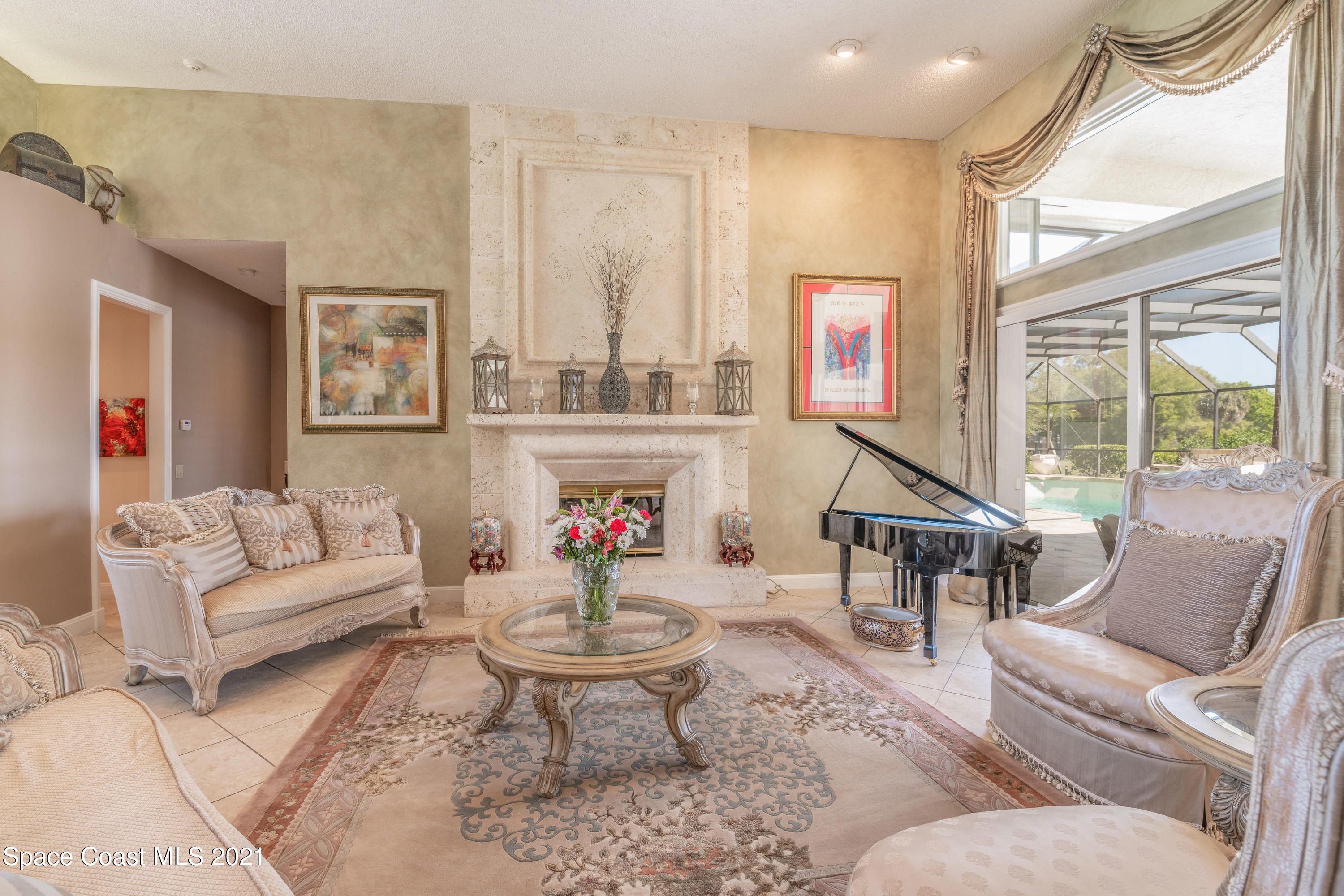 3835 Raney Road Titusville, FL 32780 - Photo 18 of 55 a living room with furniture and a large window