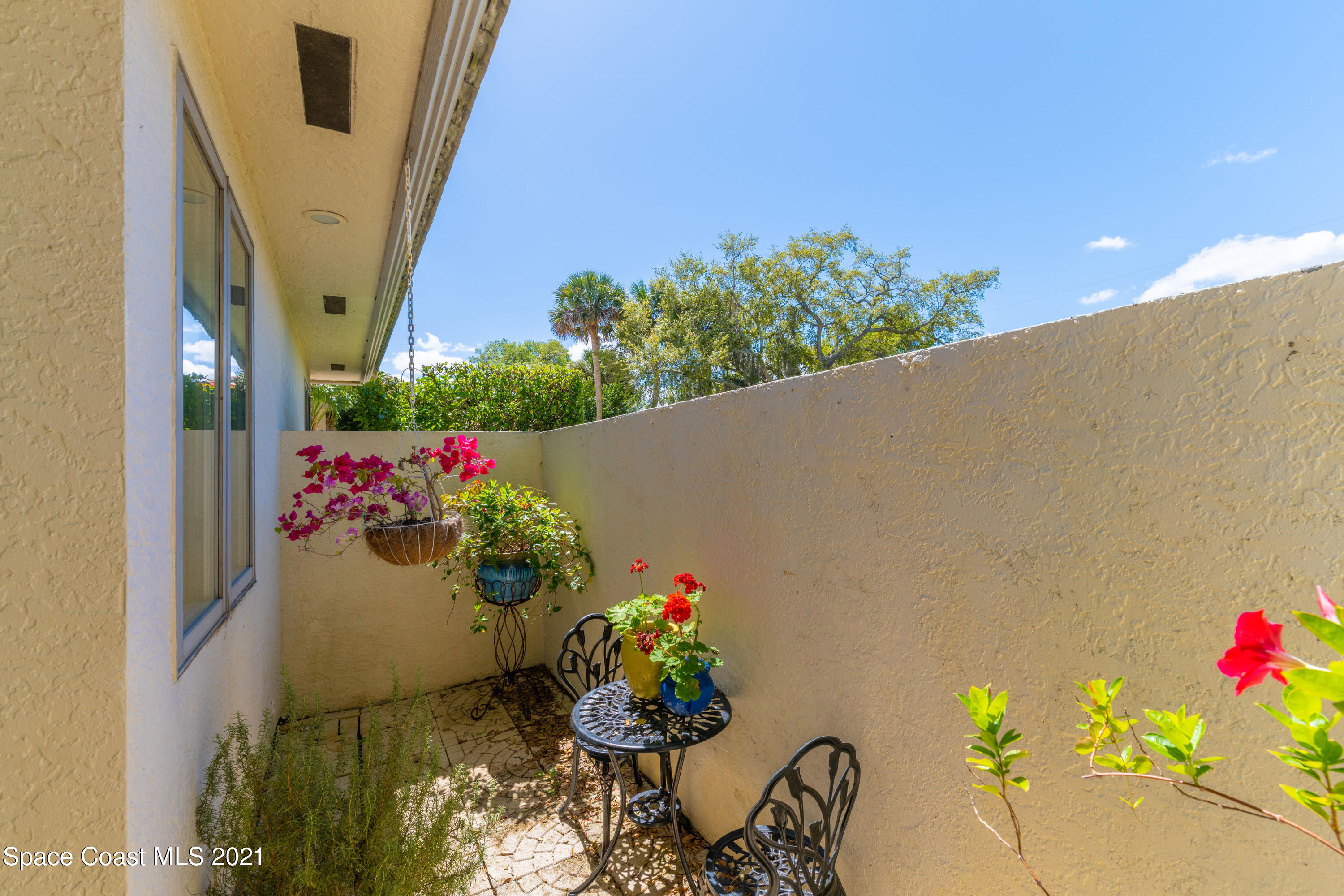 3835 Raney Road Titusville, FL 32780 - Photo 37 of 55 a front view of a house with a yard