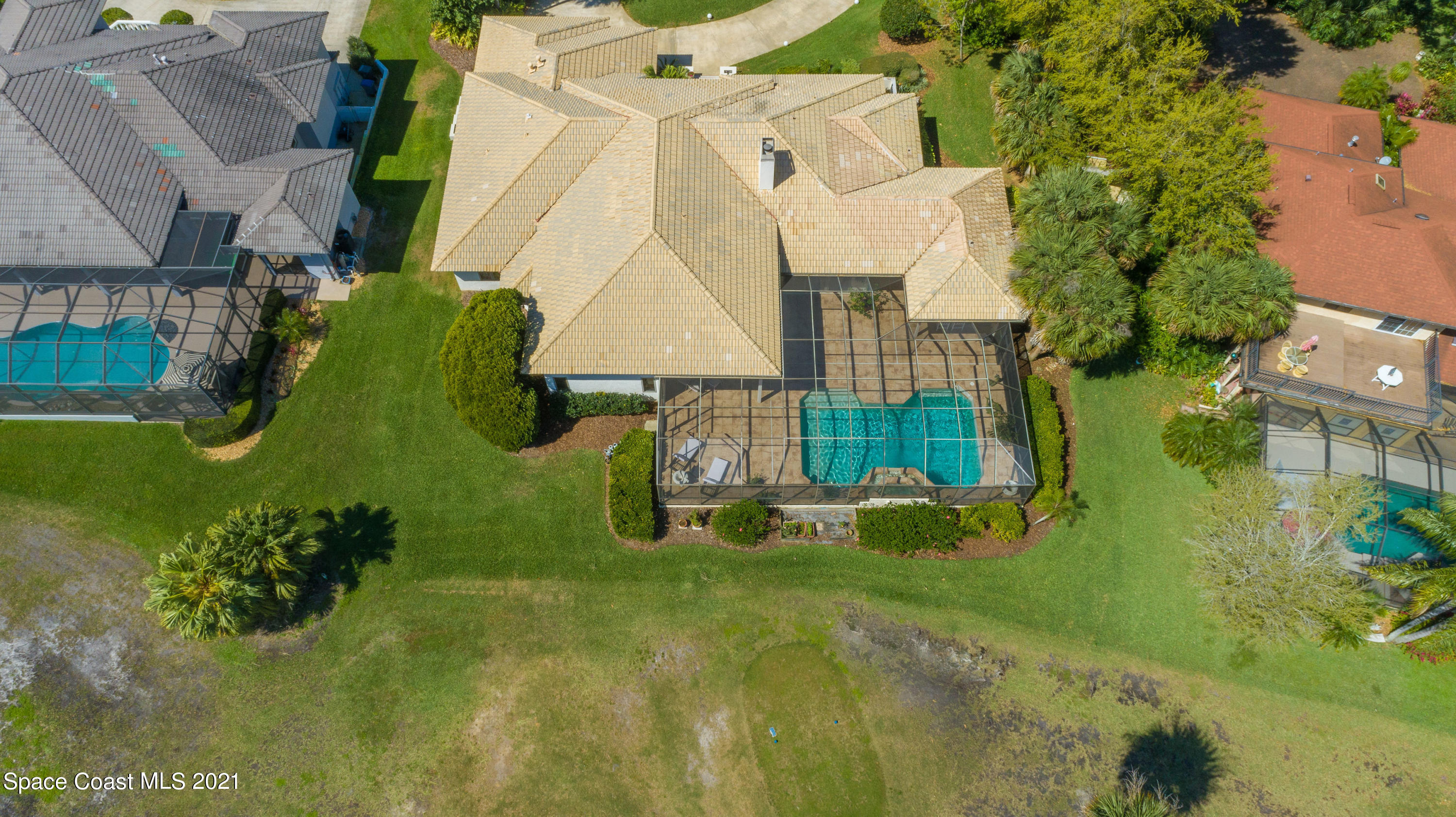 3835 Raney Road Titusville, FL 32780 - Photo 48 of 55 an aerial view of a house with a yard