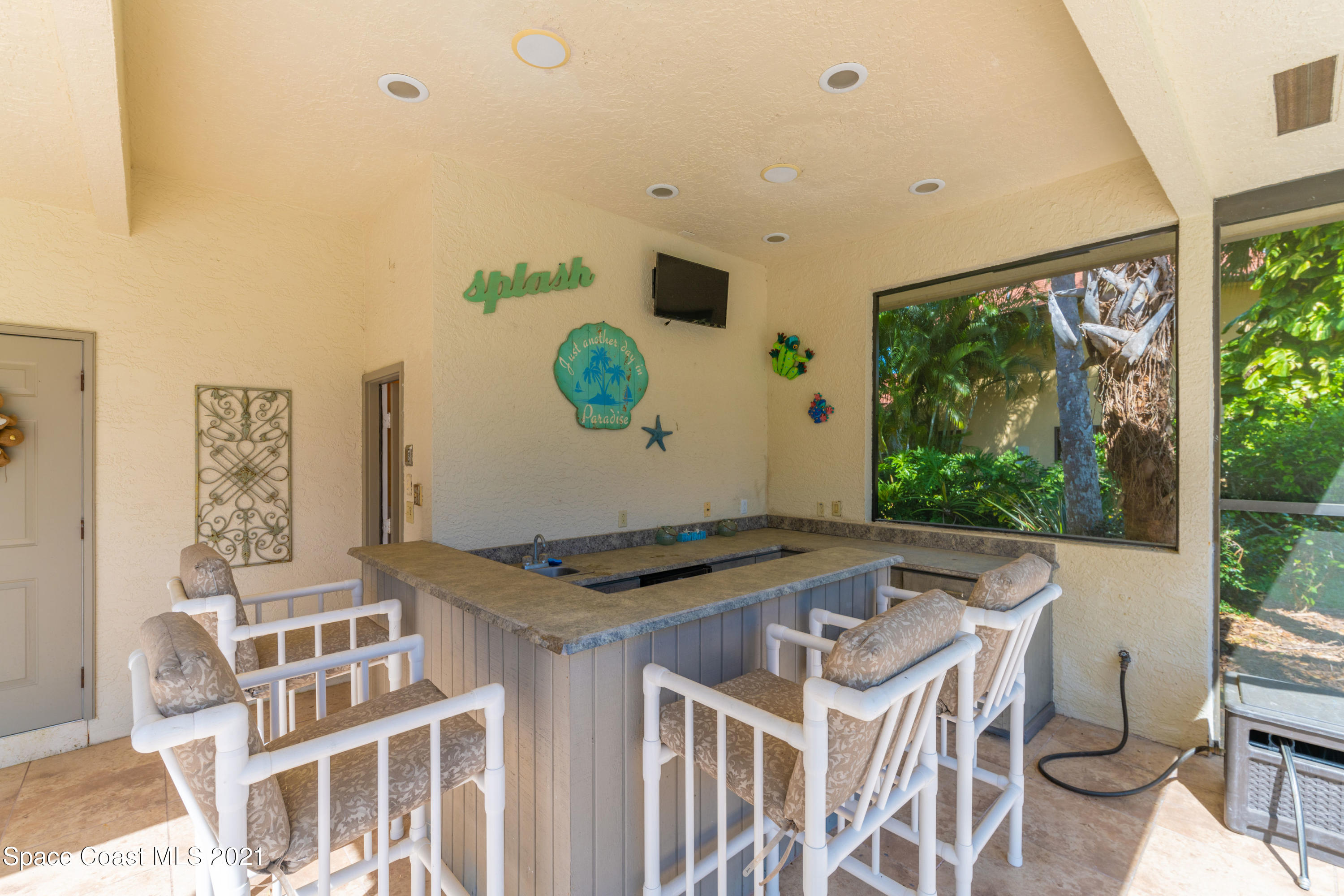 3835 Raney Road Titusville, FL 32780 - Photo 52 of 55 a kitchen that has a stove and a table