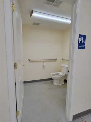 a bathroom with a toilet
