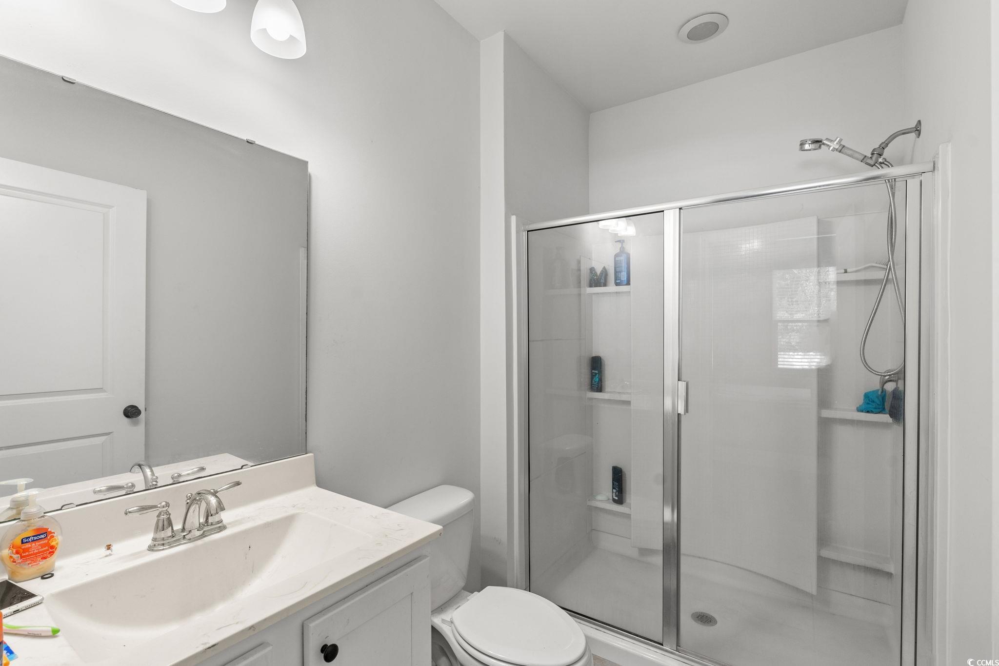 236 Legends Village Loop Myrtle Beach, SC 29579 - Photo 12 of 23 Full bath with vanity and a stall shower