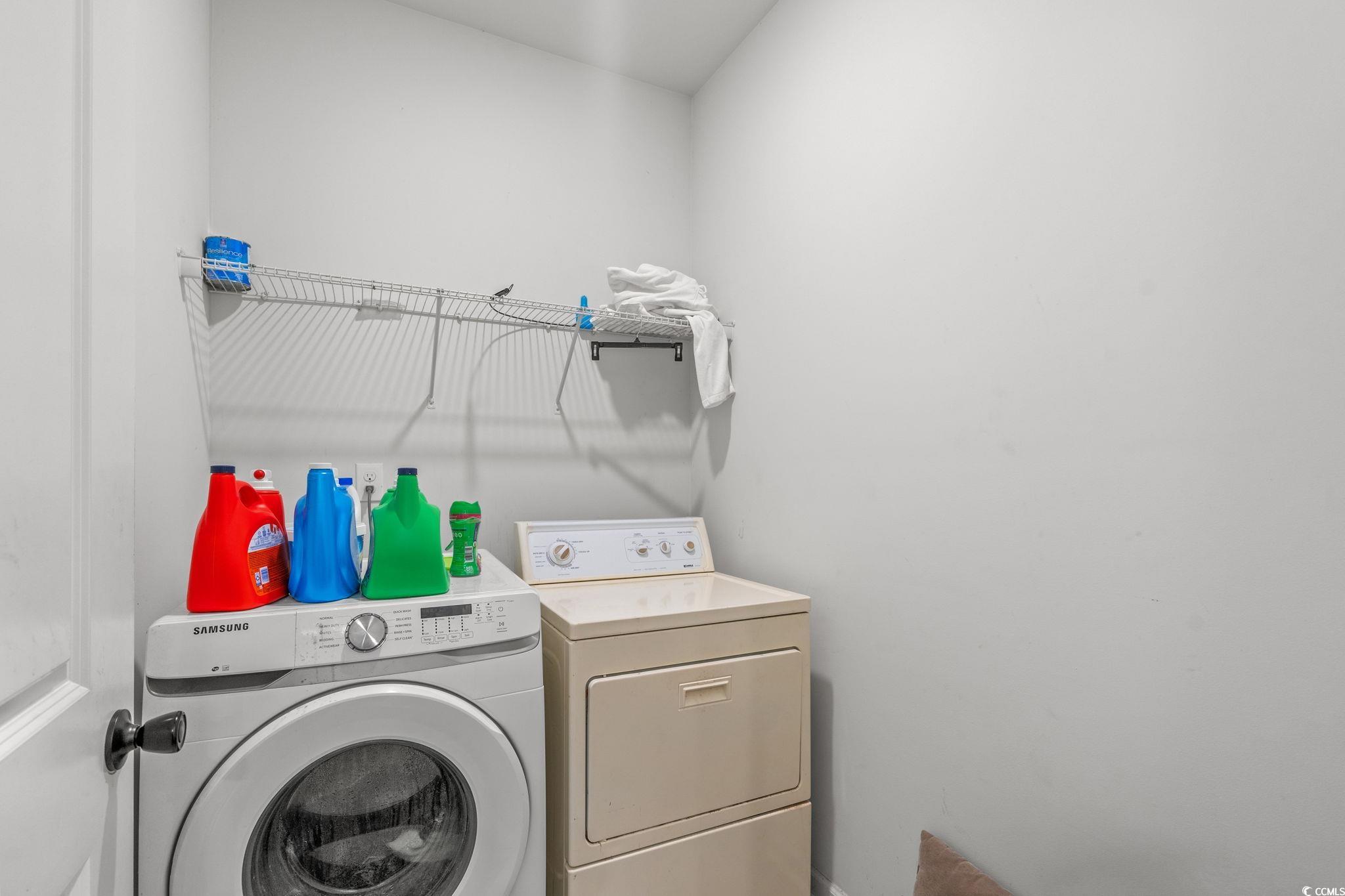 236 Legends Village Loop Myrtle Beach, SC 29579 - Photo 15 of 23 Laundry area featuring washer and dryer