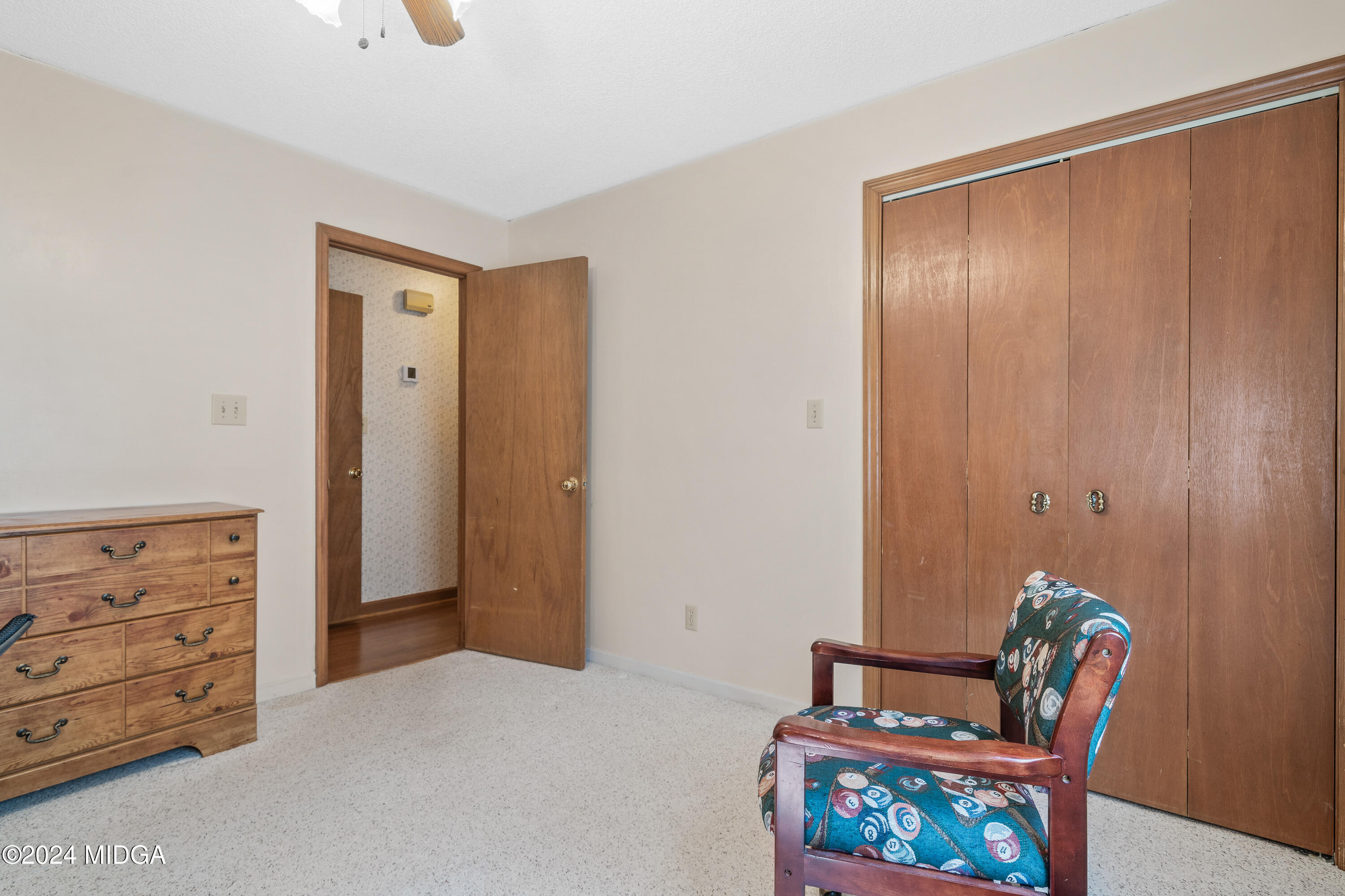 112 Whitehead Place Gray, GA 31032 - Photo 18 of 36 a bedroom with a bed and furniture