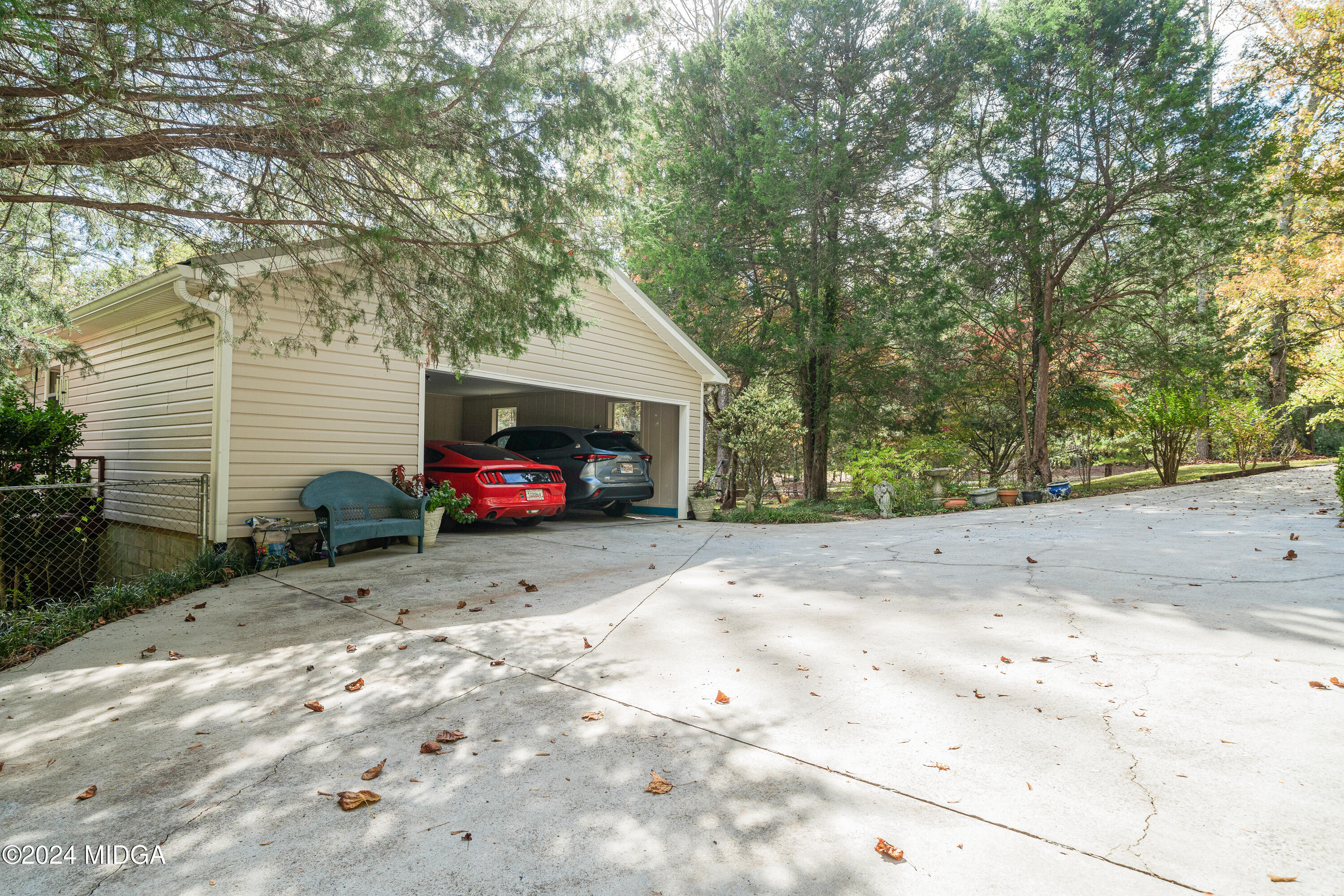 112 Whitehead Place Gray, GA 31032 - Photo 33 of 36 a view of a car park in front of a house