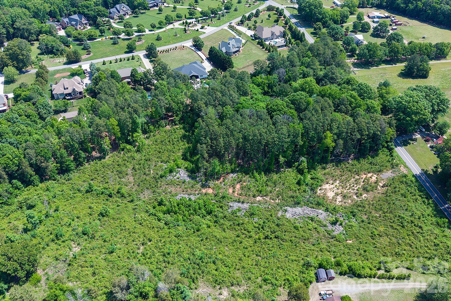 13745 Ramah Church Road Huntersville, NC 28078 - Photo 5 of 17 a view of a garden with plants