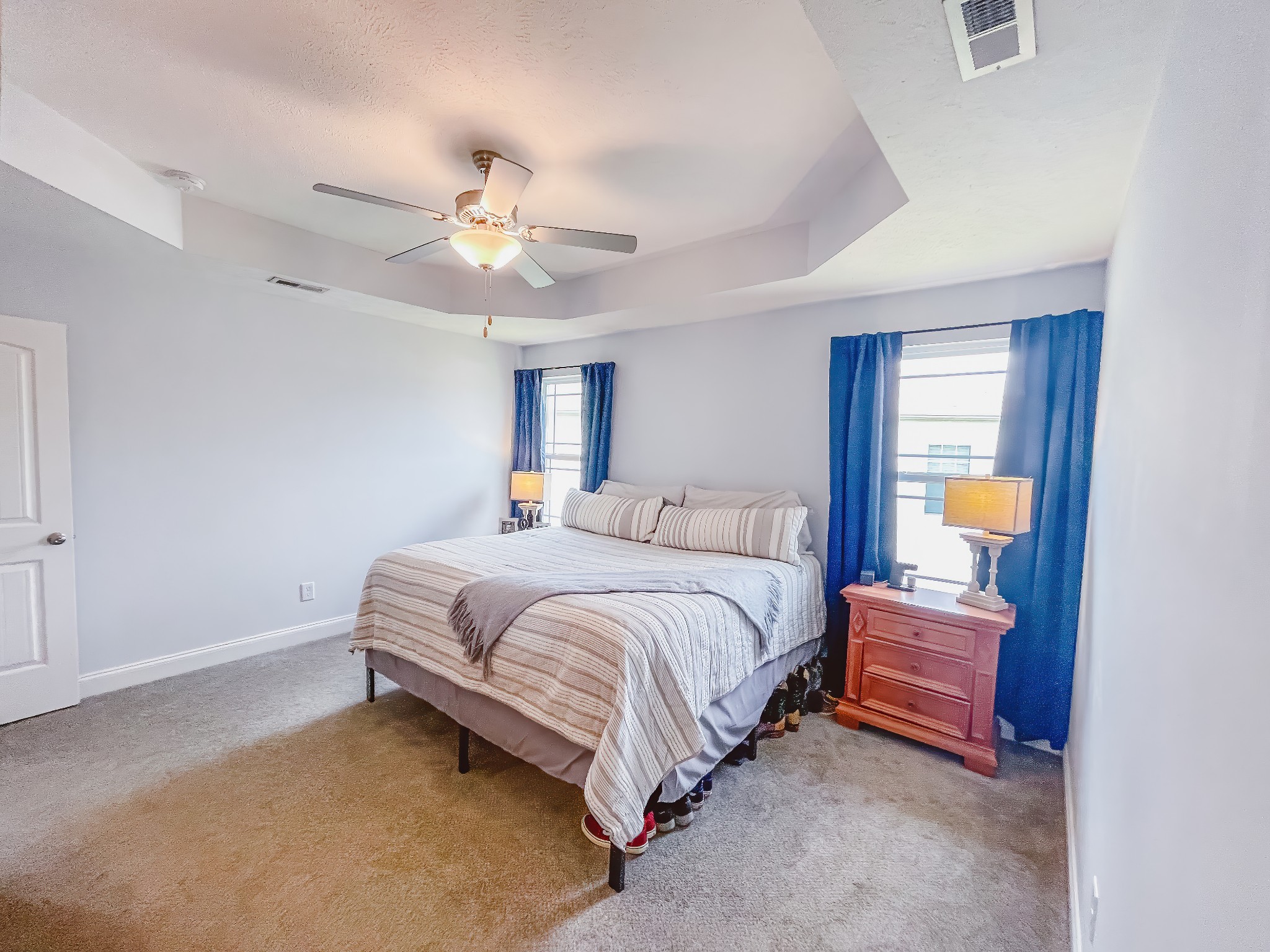 107 Sage Drive Springfield, TN 37172 - Photo 8 of 16 a bedroom with a bed and a chandelier