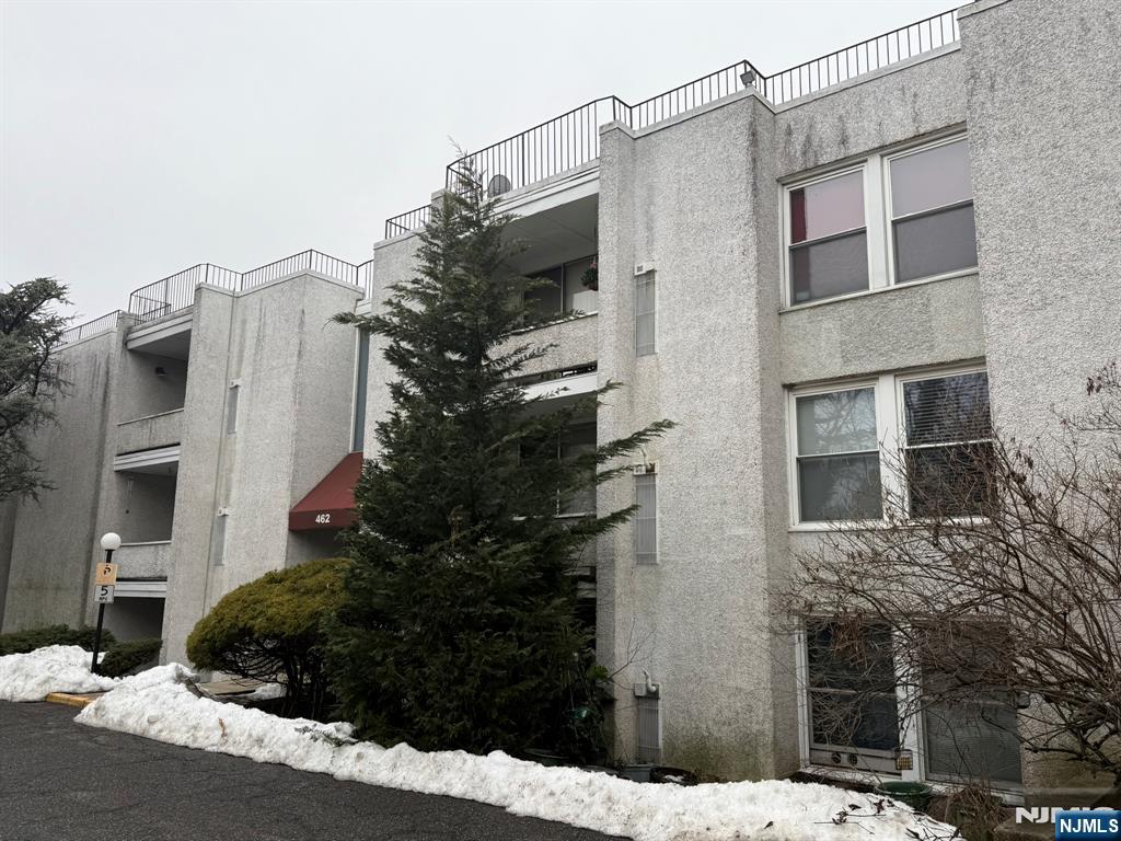 462 River Road, Unit C Nutley, NJ 07110 - Photo 5 of 10 a view of a house with a garden