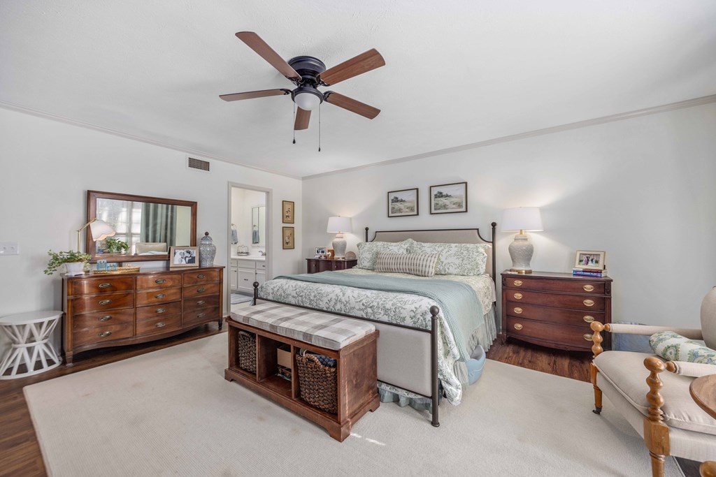 2525 Norris Road, Unit 98 Columbus, GA 31907 - Photo 17 of 40 a bedroom with a bed and furniture