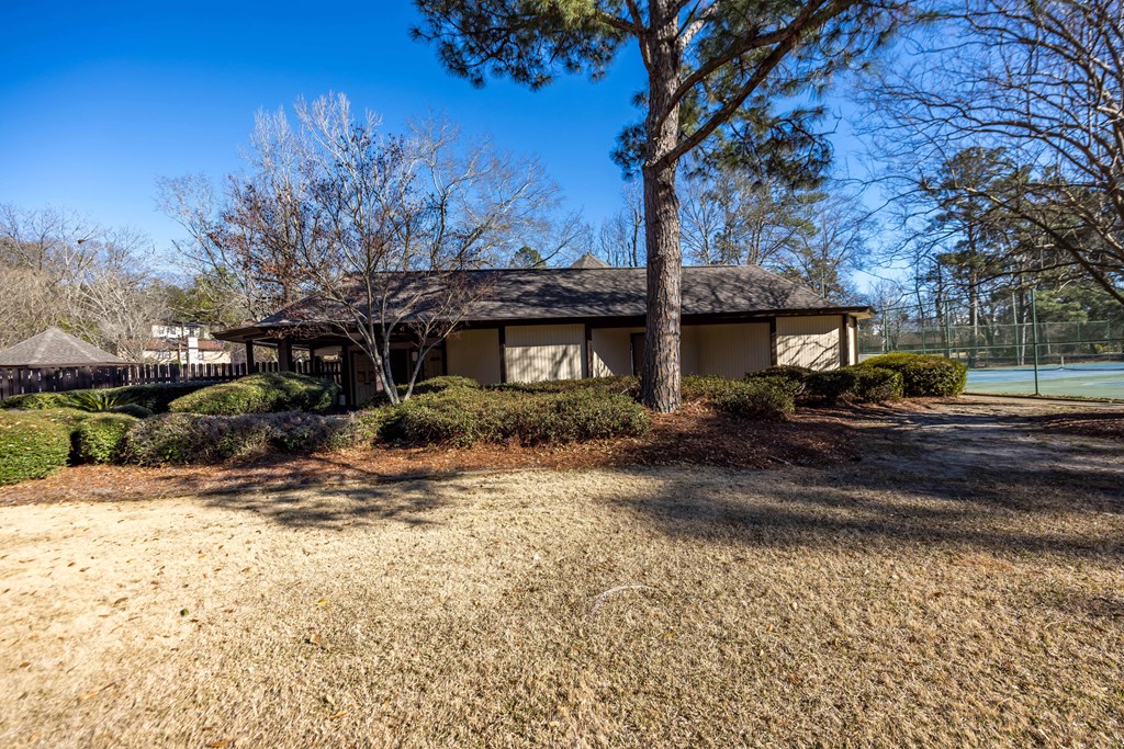 2525 Norris Road, Unit 98 Columbus, GA 31907 - Photo 30 of 40 a front view of a house with a yard