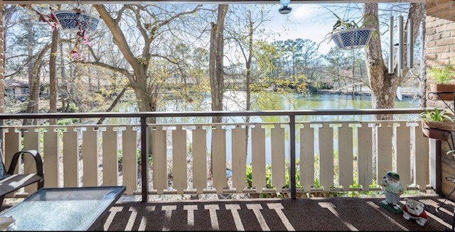2525 Norris Road, Unit 98 Columbus, GA 31907 - Photo 5 of 40 a view of a balcony with wooden floor and fence