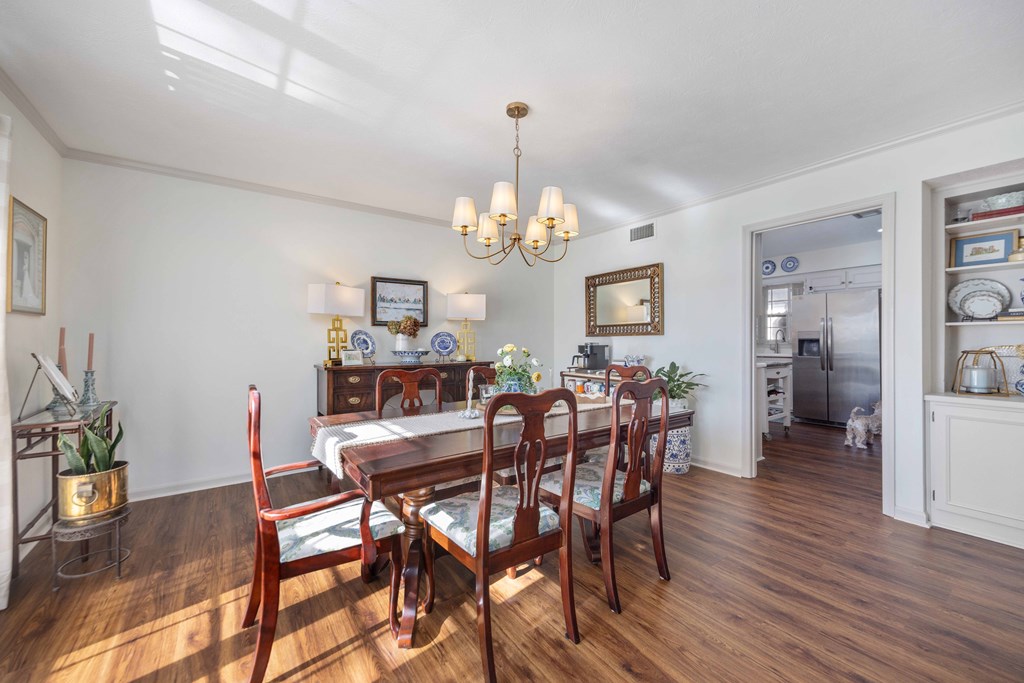 2525 Norris Road, Unit 98 Columbus, GA 31907 - Photo 7 of 40 a view of a dining room with furniture and wooden floor