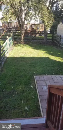 a view of yard with an outdoor space