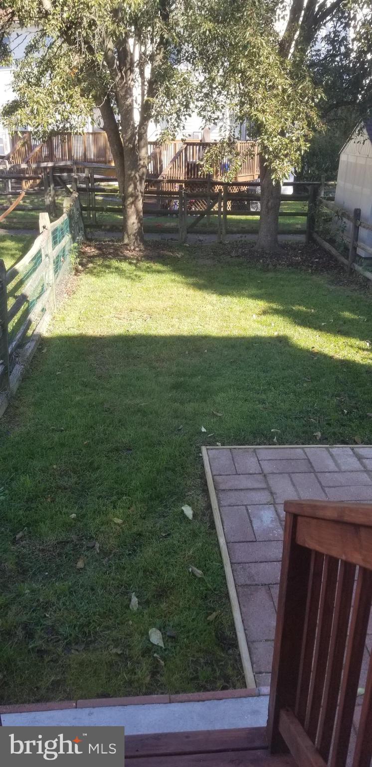 212 Bell Ringer Court Newark, DE 19702 - Photo 2 of 15 a view of yard with an outdoor space