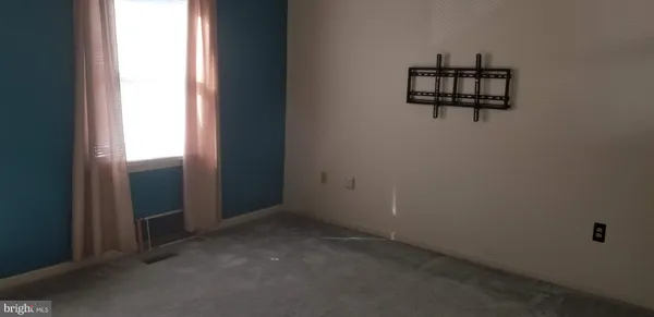 a view of a small space with window