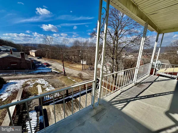 a view of a balcony with an outdoor space