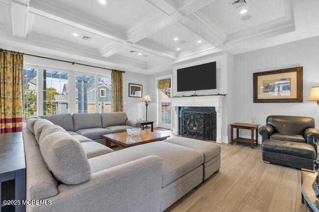 308 Pennsylvania Avenue Spring Lake, NJ 07762 - Photo 12 of 67 a living room with furniture fireplace and flat screen tv
