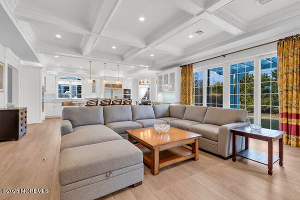 a kitchen with granite countertop a sink and cabinets