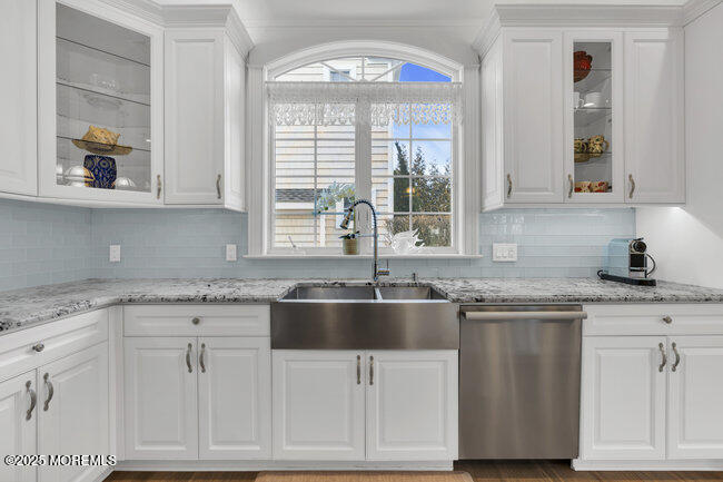 308 Pennsylvania Avenue Spring Lake, NJ 07762 - Photo 19 of 67 a kitchen with granite countertop a sink and cabinets