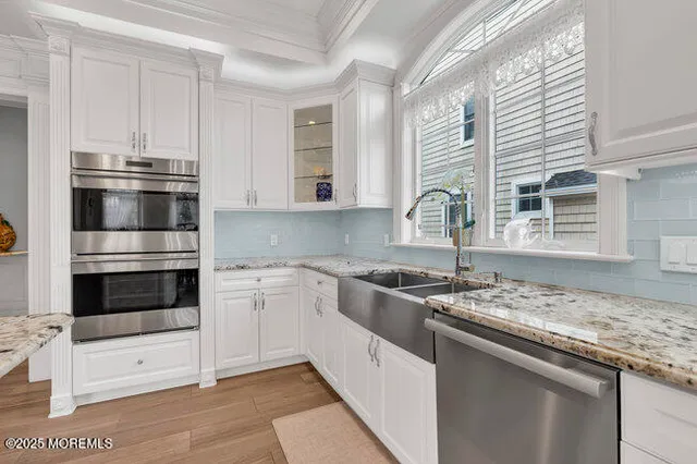 a bedroom with bed and window