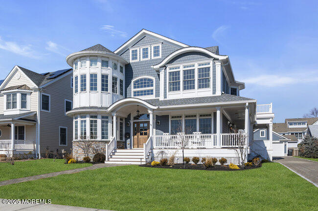 308 Pennsylvania Avenue Spring Lake, NJ 07762 - Photo 2 of 67 a front view of a house with a yard