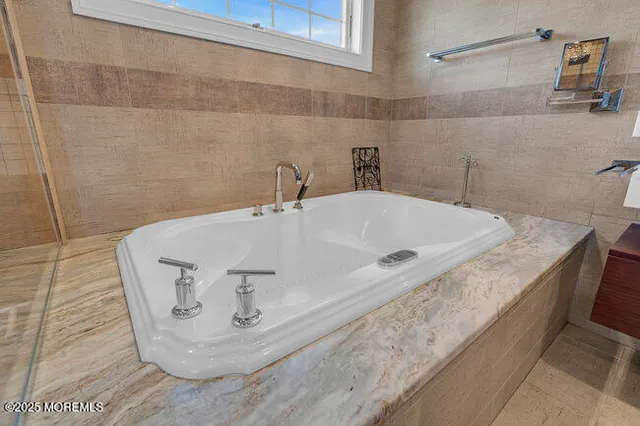 a view of a wooden deck with a yard