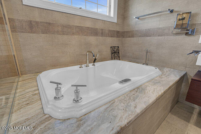 308 Pennsylvania Avenue Spring Lake, NJ 07762 - Photo 26 of 67 a bath tub sitting in a bathroom