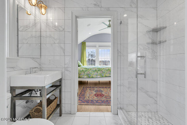 308 Pennsylvania Avenue Spring Lake, NJ 07762 - Photo 32 of 67 a bathroom with a sink and a mirror