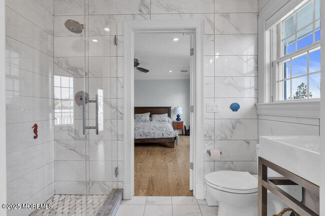 308 Pennsylvania Avenue Spring Lake, NJ 07762 - Photo 33 of 67 a bathroom with a toilet and a shower