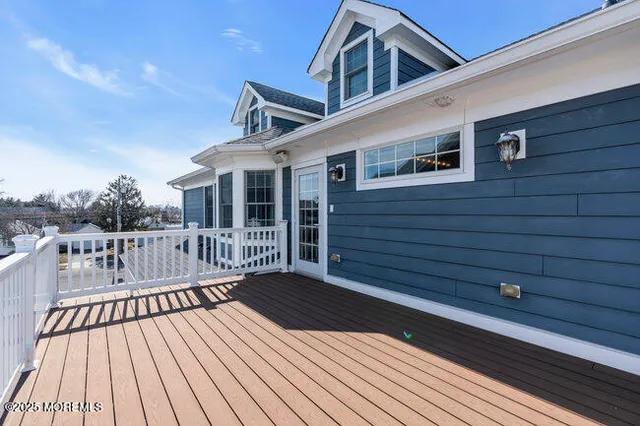 a bathroom with a sink toilet and mirror
