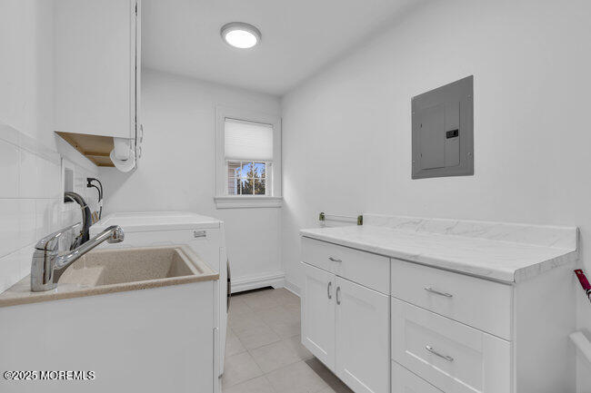 308 Pennsylvania Avenue Spring Lake, NJ 07762 - Photo 37 of 67 a bathroom with a sink and a mirror