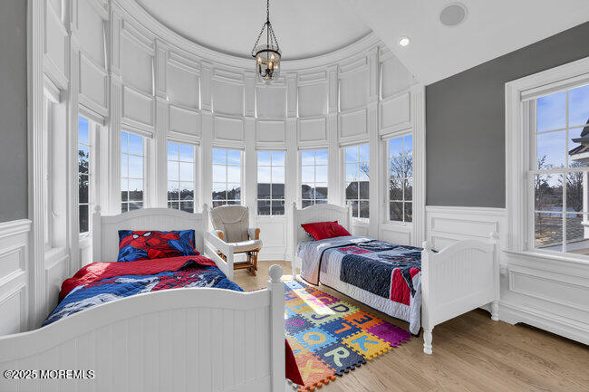 308 Pennsylvania Avenue Spring Lake, NJ 07762 - Photo 40 of 67 a living room with a bed furniture and a painting on the wall
