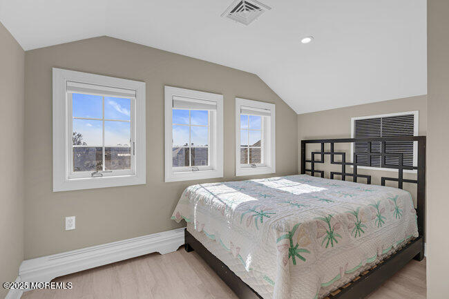308 Pennsylvania Avenue Spring Lake, NJ 07762 - Photo 42 of 67 a bedroom with a large bed and a window