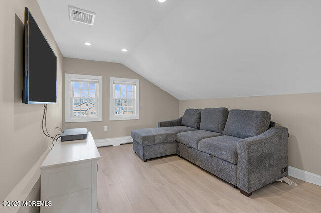 308 Pennsylvania Avenue Spring Lake, NJ 07762 - Photo 44 of 67 a living room with furniture and a flat screen tv
