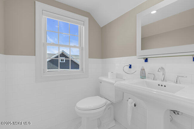 308 Pennsylvania Avenue Spring Lake, NJ 07762 - Photo 46 of 67 a bathroom with a sink toilet and mirror