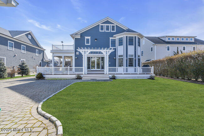 308 Pennsylvania Avenue Spring Lake, NJ 07762 - Photo 49 of 67 a front view of a house with a yard