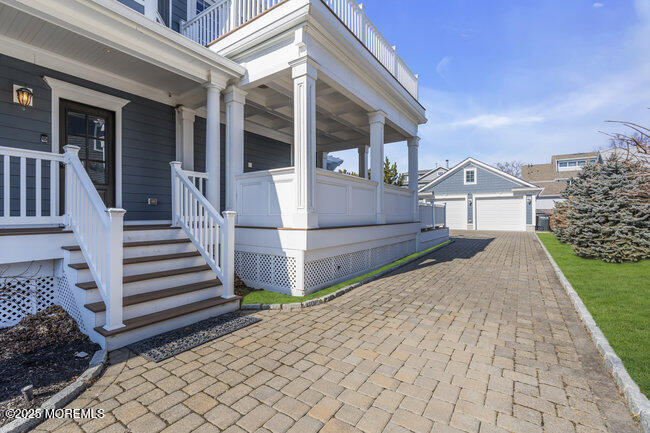 308 Pennsylvania Avenue Spring Lake, NJ 07762 - Photo 50 of 67 a view of a house with wooden fence and two windows