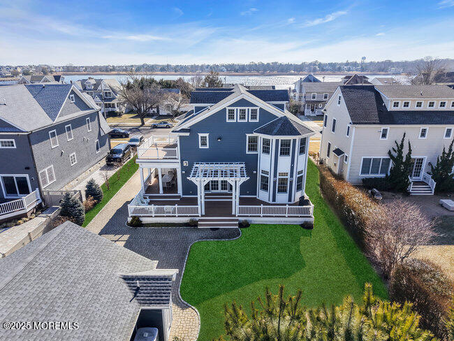 308 Pennsylvania Avenue Spring Lake, NJ 07762 - Photo 59 of 67 an aerial view of a house with a garden and lake view