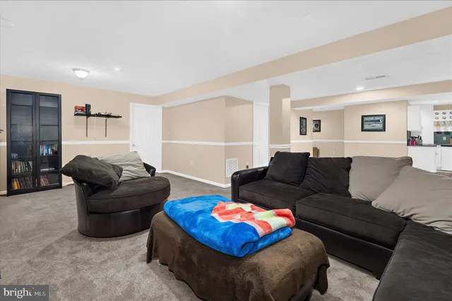 a view of an empty room with shelves